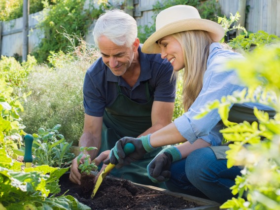 male and female gardening