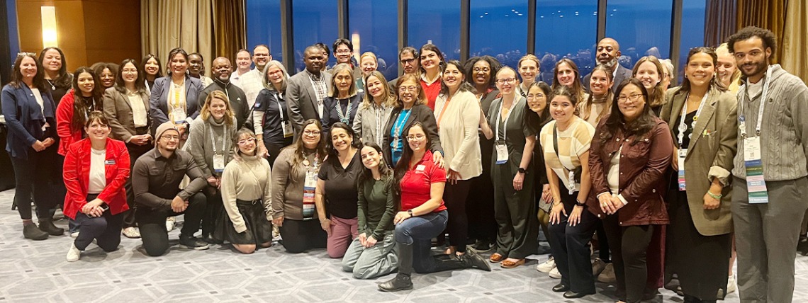 Group of MEZCOPH students, faculty and alumni at the 2024 APHA reception